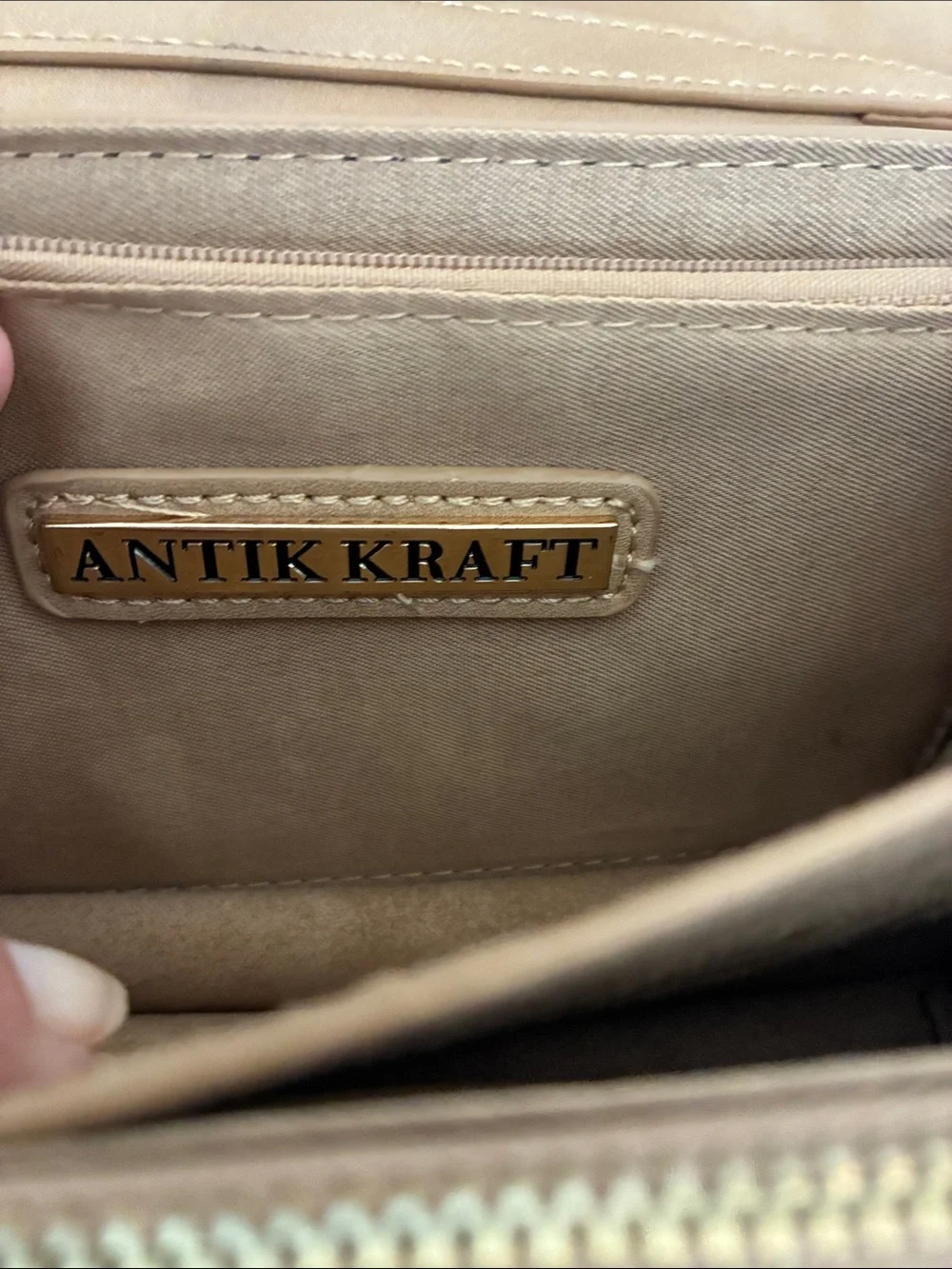 Stylish Tan Crossbody Bag with Gold Accent Hardware
